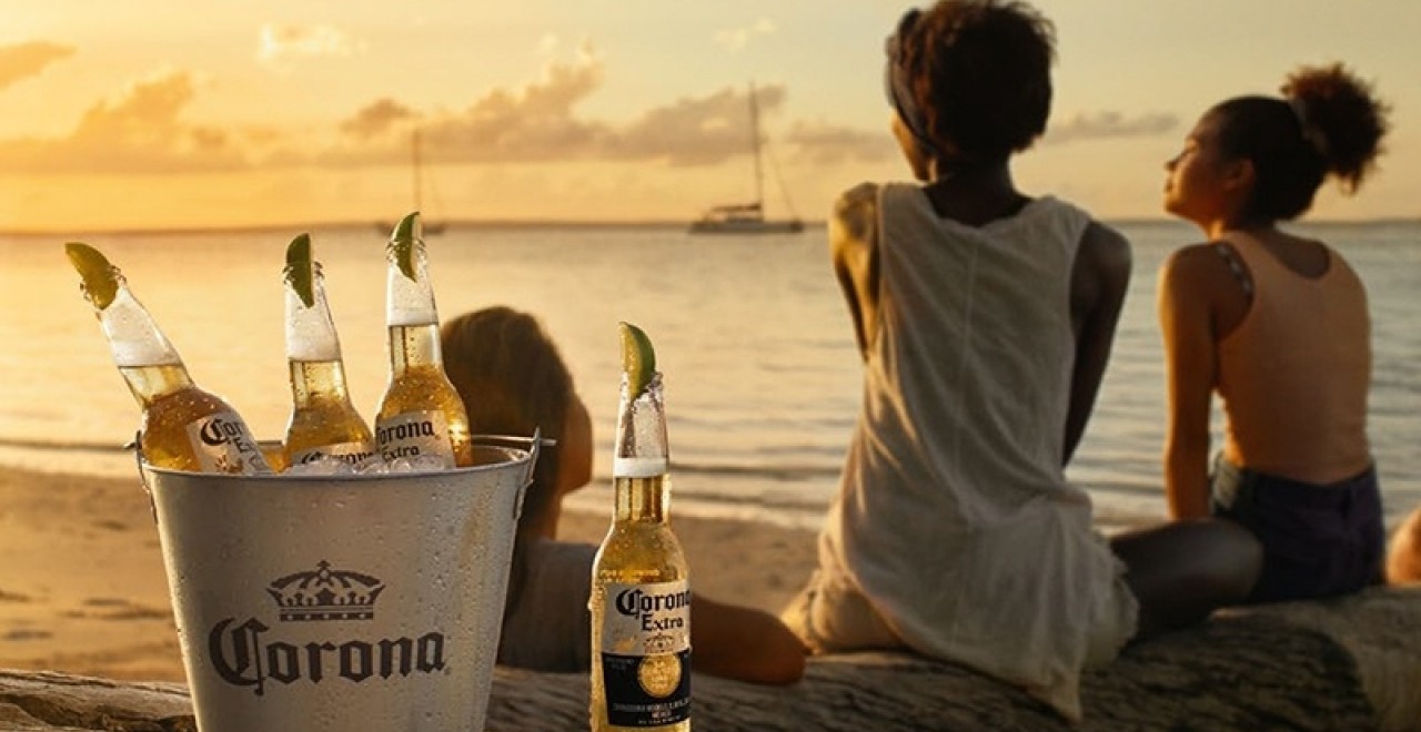 CORONA: PRODOTTA CON 100% INGREDIENTI NATURALI CORONA TORNA ON AIR - Birra  & Sound